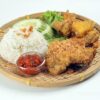 Ayam Penyet Set Fried Chicken Whole Leg Served W/ Tempeh, Tahu & Cabbage