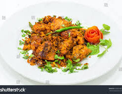 Chicken Tawa Fry Served With Tomato Rice & Potato Masala